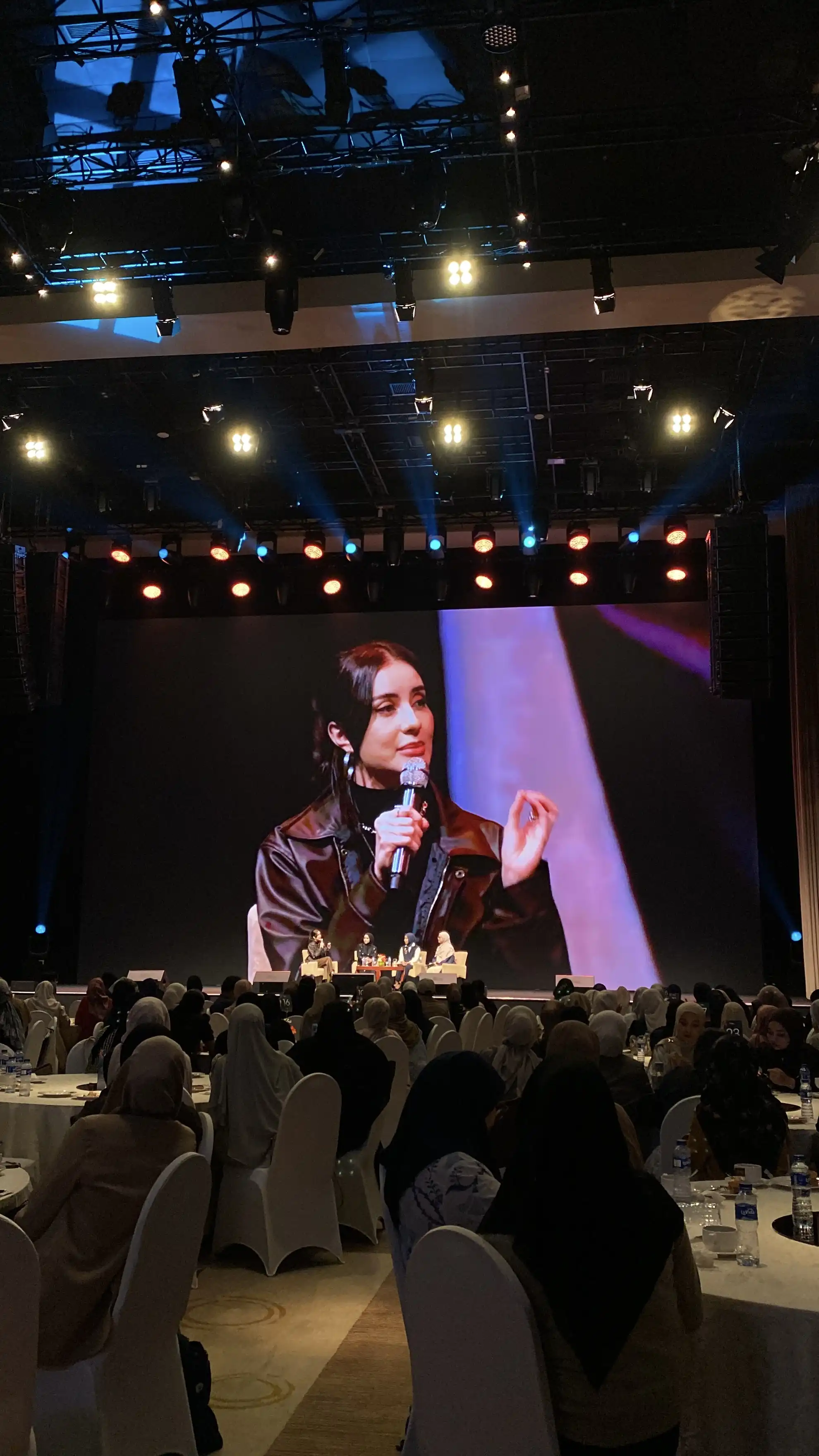 Jakarta Modest Summit 2026 stage screen close-up of a panelist speaking